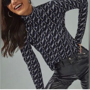 Anthropologie Maeve Black Top with White and Lavender Script